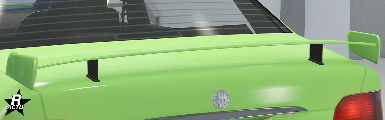 Aileron GT fixé par deux attaches au-dessus du coffre.