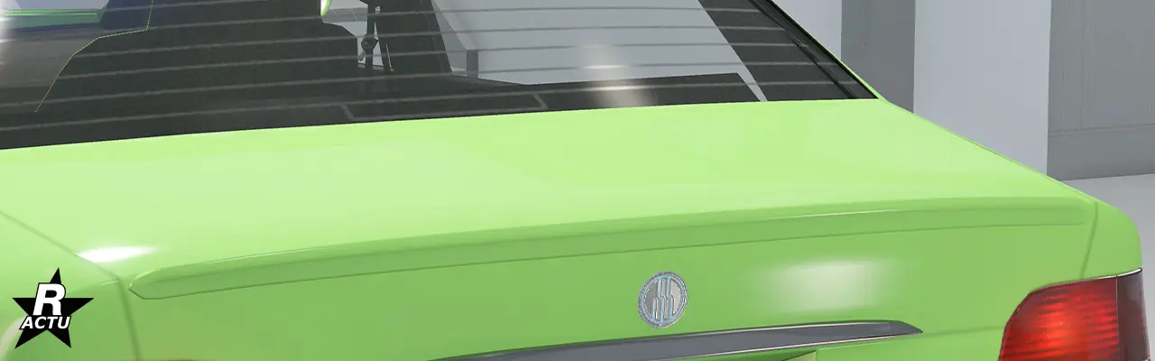 Petit aileron en forme de bec de canard fixé à l'extrémité du coffre de la voiture.