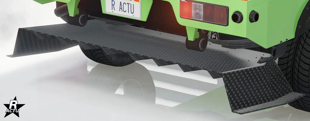 Option ajoutant un large diffuseur aérodynamique en fibres de carbone noires de forme d'un "V" inversé avec plusieurs petits râteaux intérieur sous le pare-chocs arrière de la camionnette.