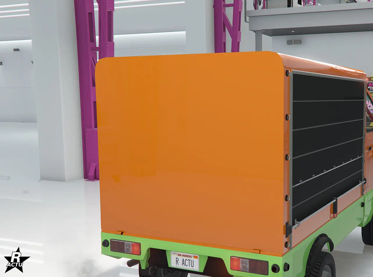 Option de personnalisation, remplaçant le plateau arrière de la camionnette, par une benne de stockage avec volets déroulant latéraux de couleur noir.