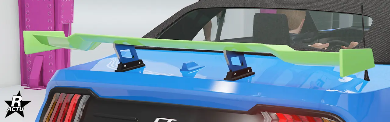 Option ajoutant un aileron de course aérodynamique de petite taille, peint dans la couleur secondaire avec ses attaches de fixations chromées, au-dessus du coffre de la voiture.