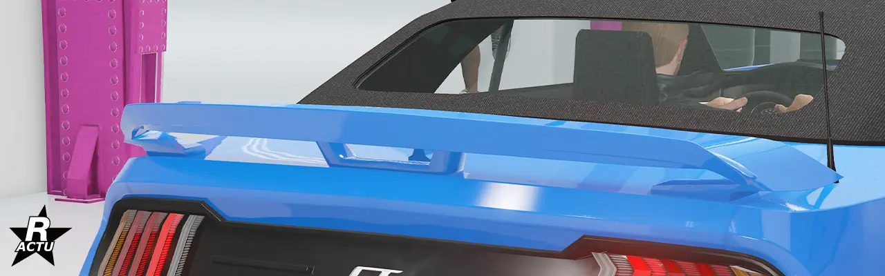 Option d'aileron aérodynamique surélevé au-dessus du coffre, peint dans la couleur principale.