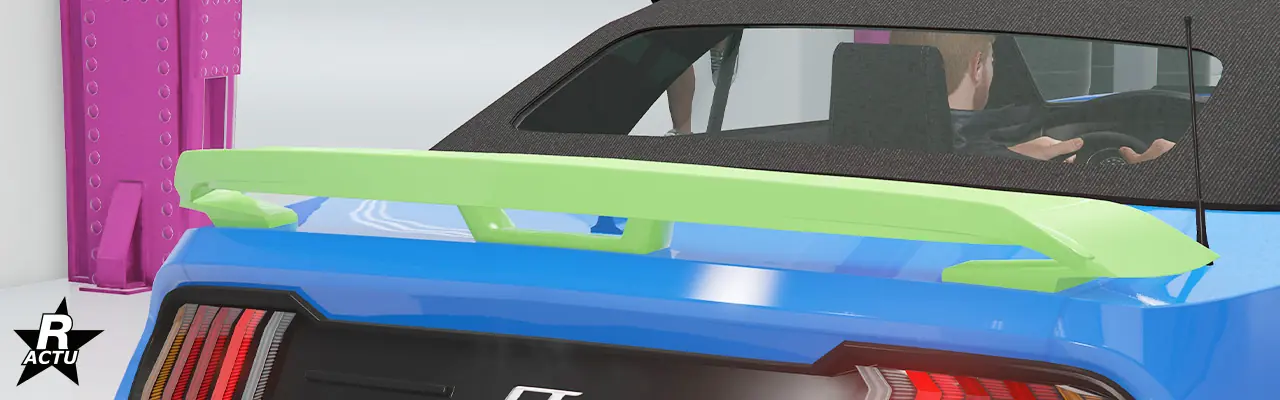 Option d'aileron aérodynamique surélevé au-dessus du coffre, peint dans la couleur secondaire.