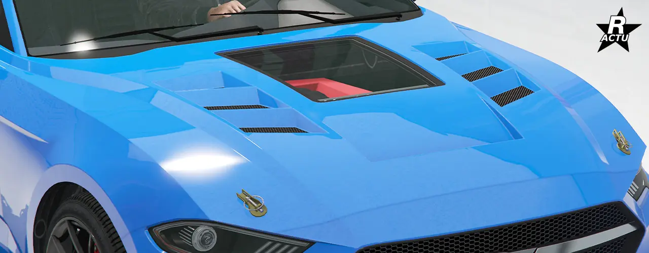 Option de capot peint dans la couleur principale, avec un alignement de 3 grilles d'aérations au niveau du côté droit et au niveau du côté gauche du capot, avec entre une vitre en verre donnant un visuel sur le moteur du véhicule. À l'avant du capot, une attache est présente de chaque côté.