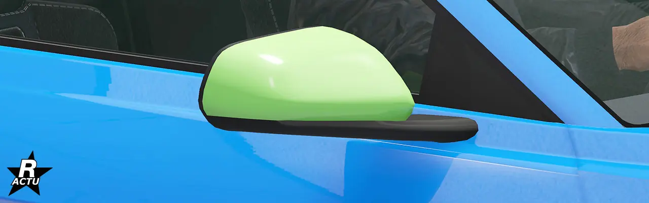 Rétroviseur couleur secondaire, fixé avec une attache noire sur la portière latérale passager.