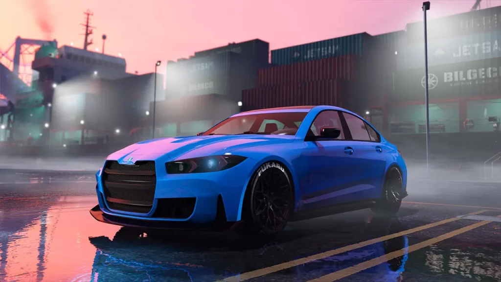 Voiture de sport allemande Ubermacht Sentinel GTS peinte en bleu, vue de devant, en début de soirée avec des conteneurs portuaires en arrière plan.