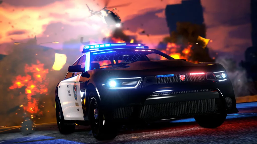 Image présentant la voiture de police Buffalo STX Pursuit avec une vue avant dans le jeu vidéo GTA Online. Le véhicule est peint en noir et blanc , ses gyrophares sont allumés et un hélicoptère de police survole la STX.