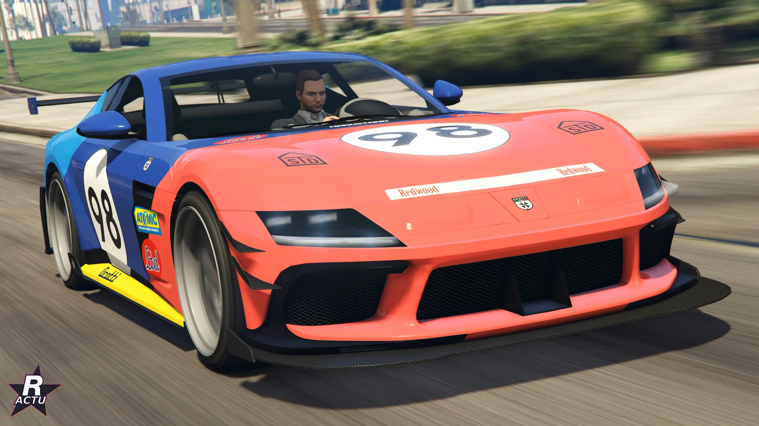 Grotti Cartuccia GT en livrée course bleu et orange n°98, vue de trois quarts avant à Los Santos