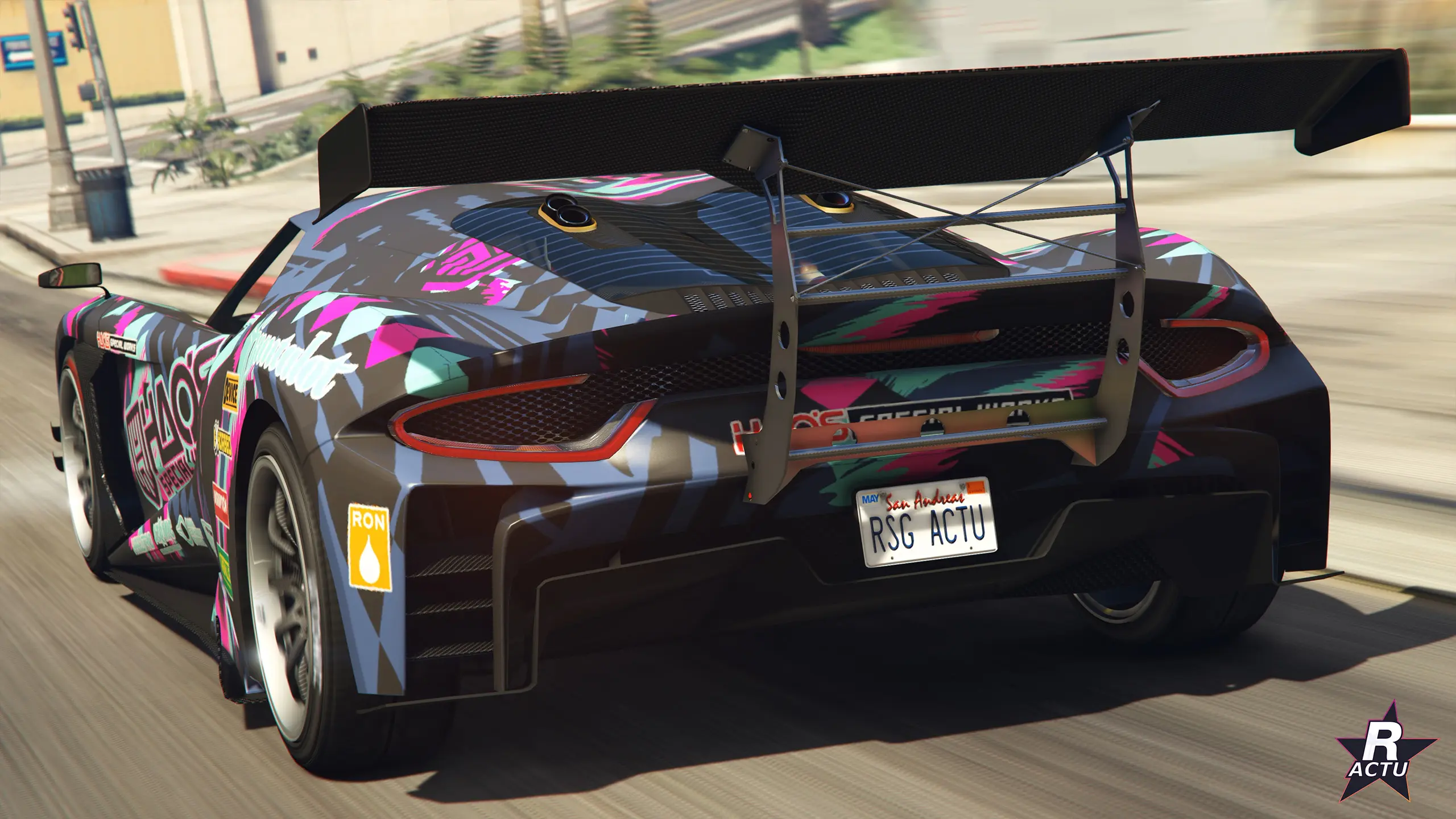 Arrière de la Grotti Veleno GT améliorée en HSW : aileron double plan et échappements bordures dorés