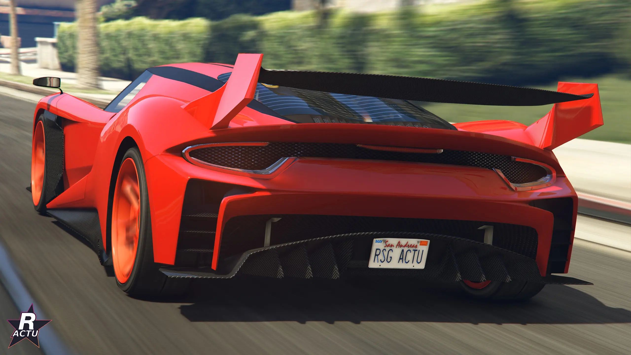 Arrière de la Grotti Veleno GT rouge : aileron, diffuseur en carbone et jantes rouges.