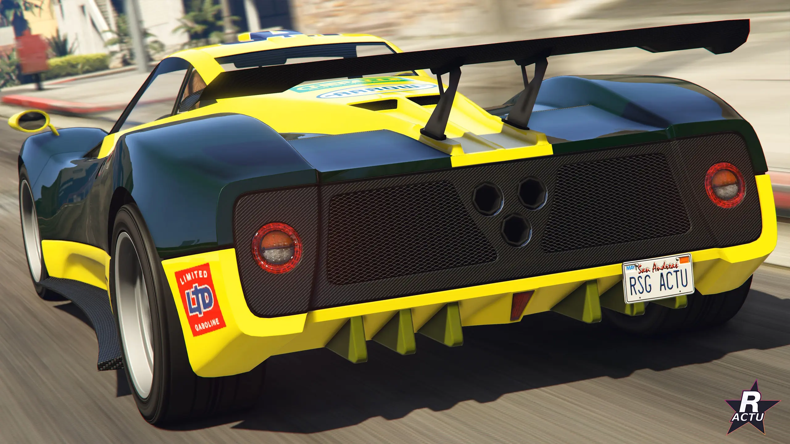 Arrière de la Pegassi Horus verte et jaune : aileron, diffuseur et échappements groupés