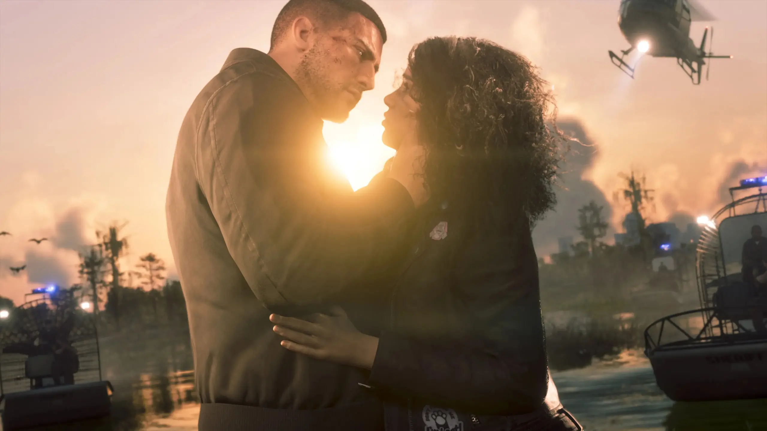 Jason et Lucia s'enlaçant dans un couché de soleil, tout en étant entouré par la police.