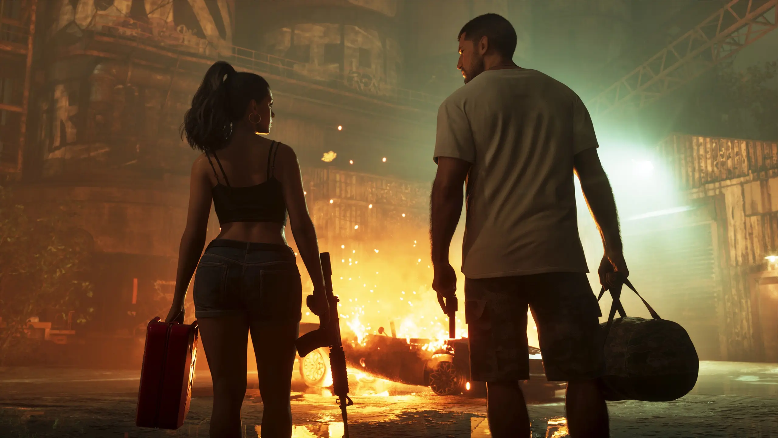 Jason et Lucia se regardant côte à côte, avec une voiture en feu devant eux.