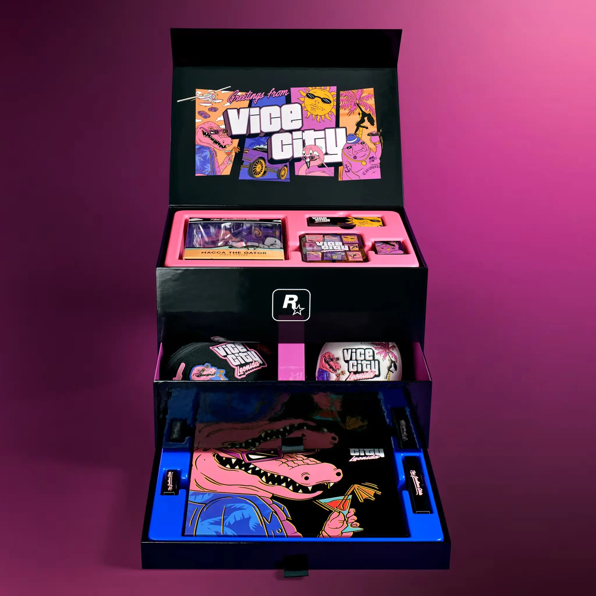 Boîte ouverte de l'édition collector de GTA VI, montrant la disposition et des objets présents à l'intérieur.