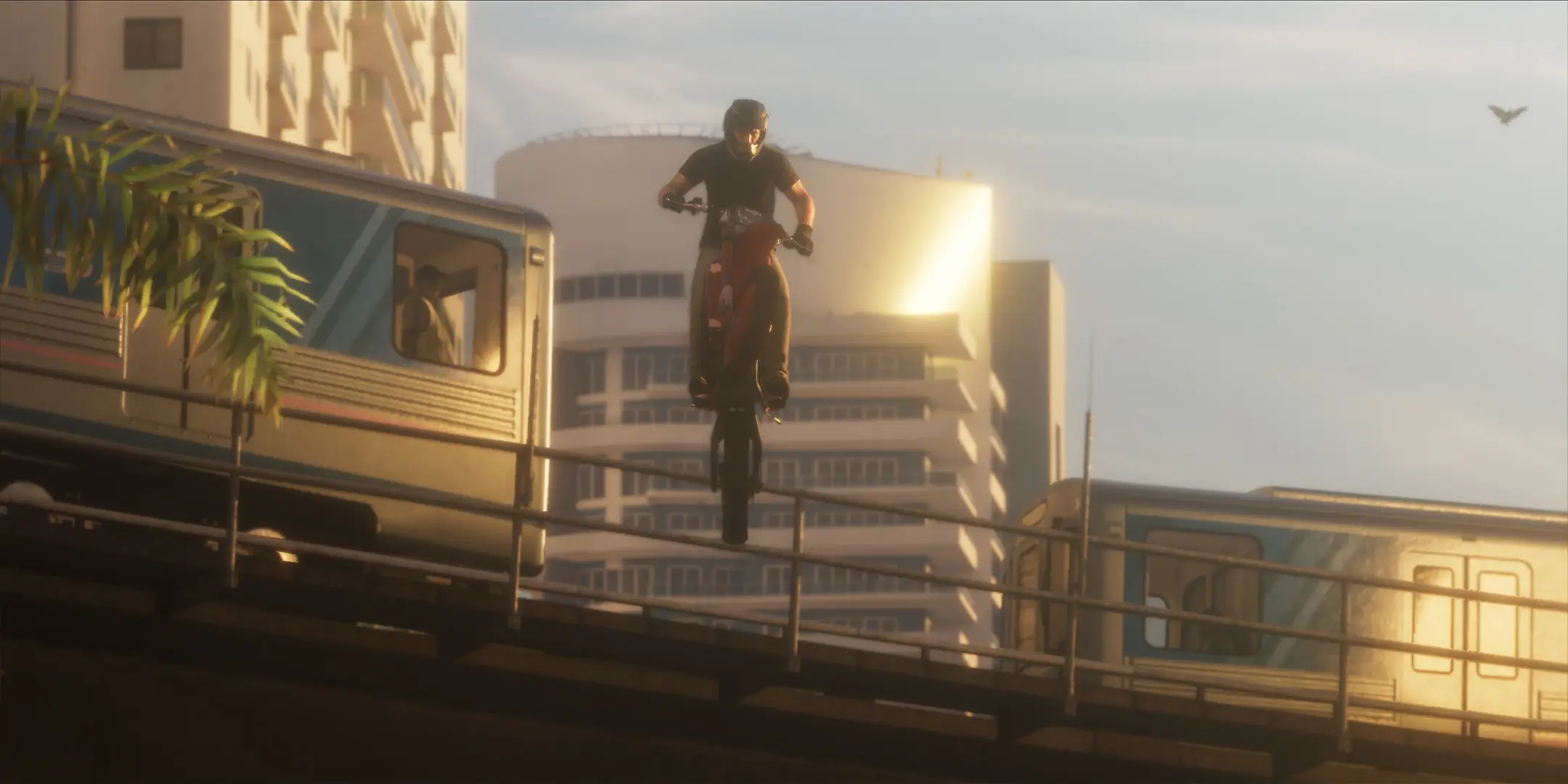 Jason Duval réalisant une cascade en moto, sautant entre deux rames du métro aérien de Vice City.