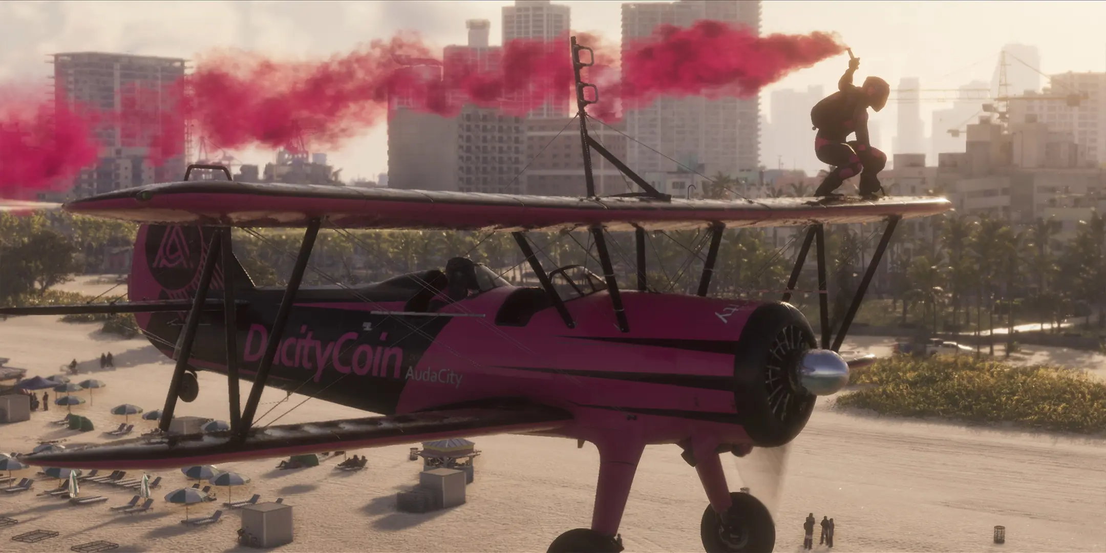 Gros plan sur un avion survolant une plage de GTA VI, une personne réalise une cascade avec une fumigène rouge dans la main.