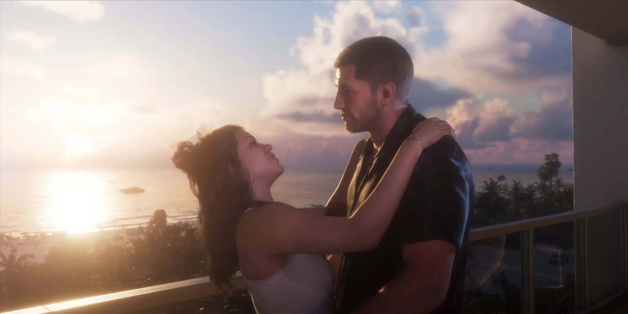 Lucia Caminos et Jason Duval s'enliassant amoureusement, sur un balcon donnant sur un magnifique couché de soleil.